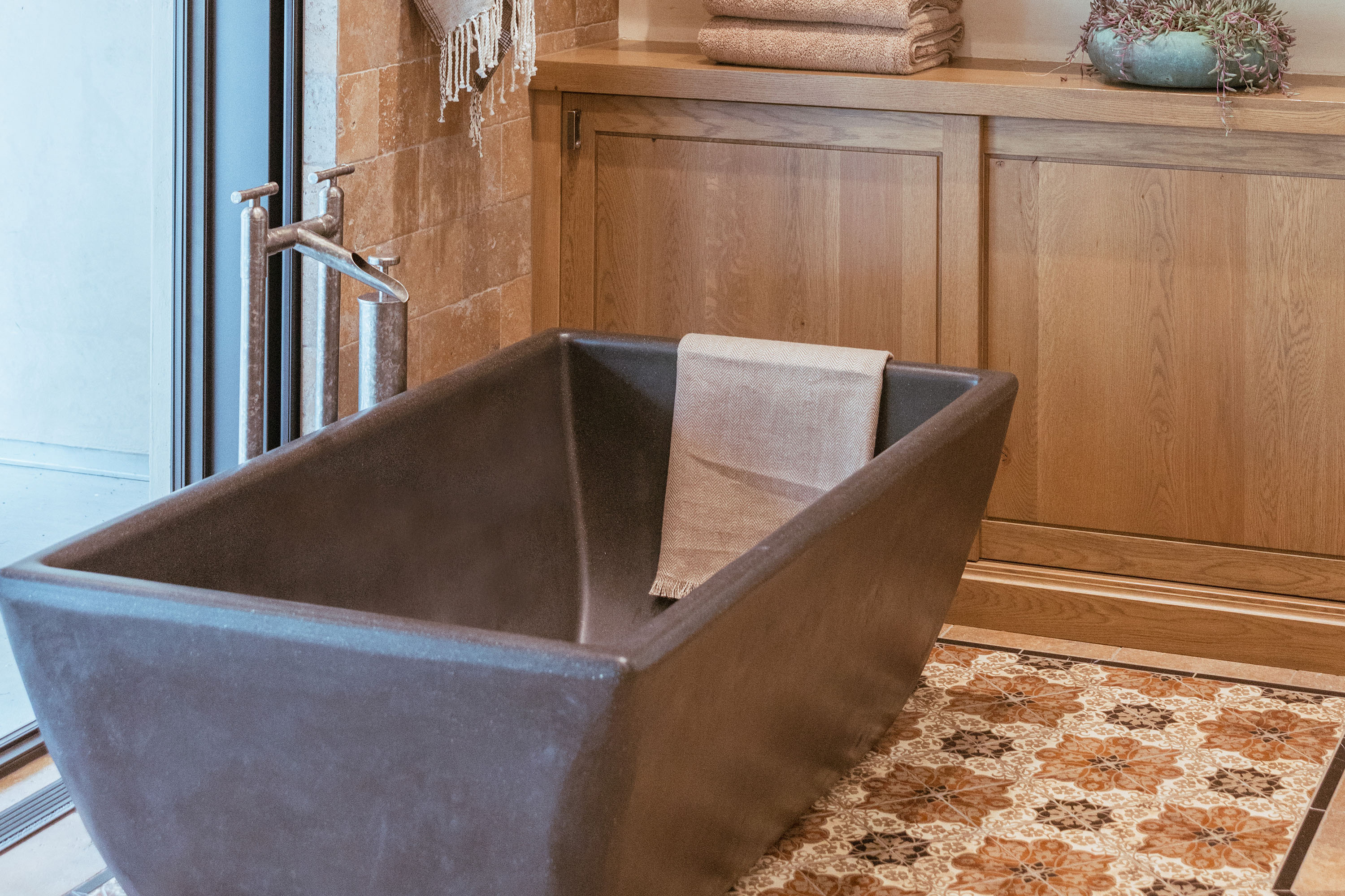 The Indulge Concrete Soaking Tub